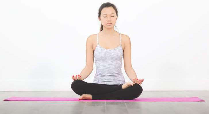 woman-yoga-mat-meditation