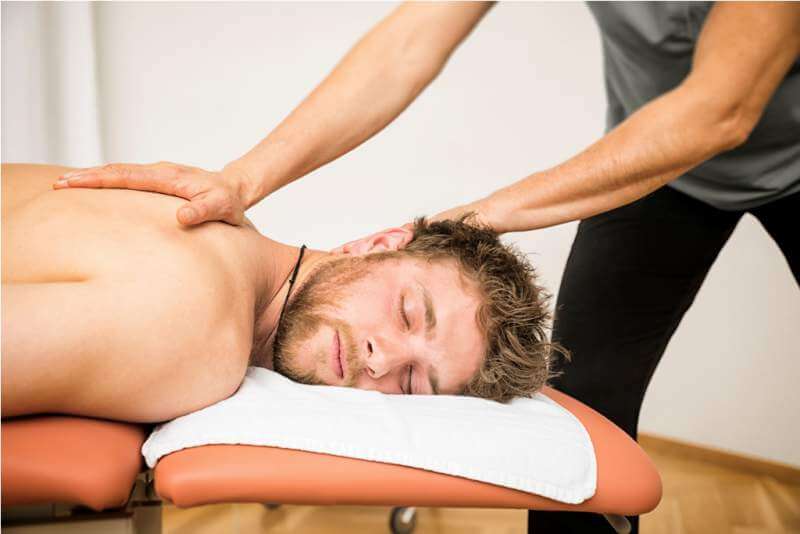 young man at the physio therapy