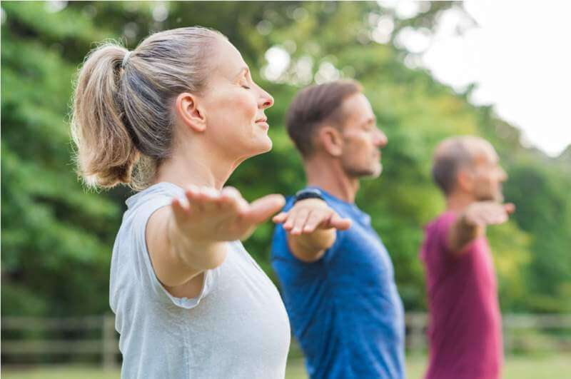 Group of people doing yoga