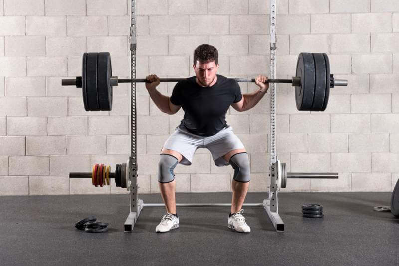 man-performing-a-crossfit-back-squat-exercise