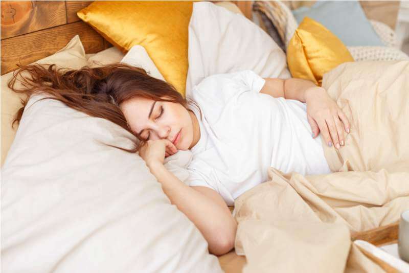 portrait-of-a-young-girl-sleeping-on-a-pillow