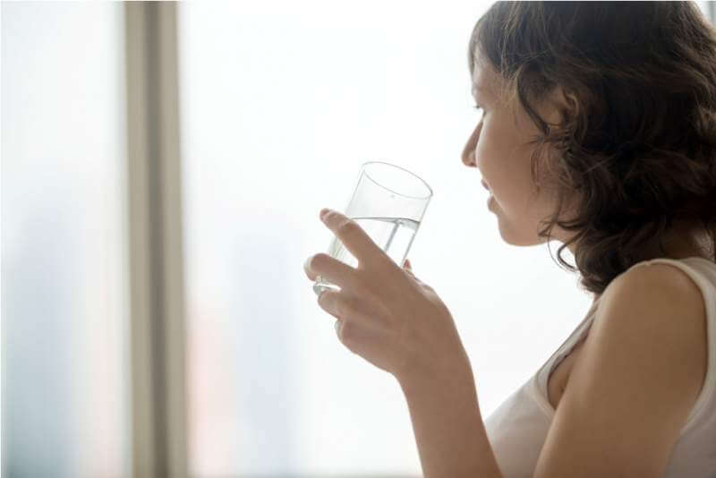 young-woman-with-glass-of-water