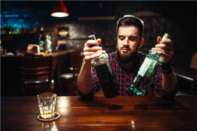 alcoholic-sitting-at-the-bar-counter-drunkenness