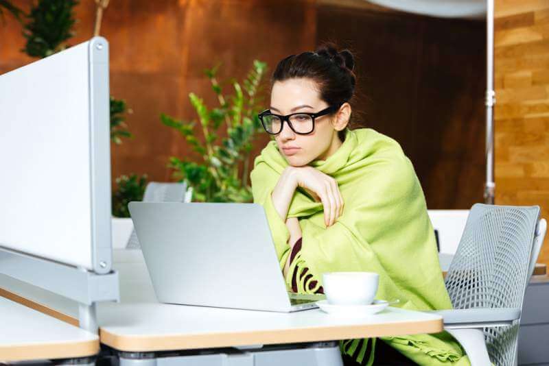 beautiful-thoughtful-woman-using-laptop