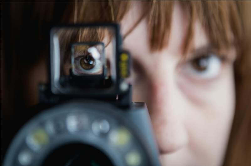 womans-eye-in-viewfinder