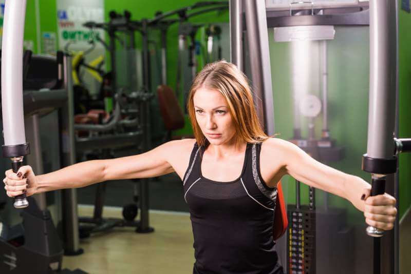 young-fitness-woman-execute-exercise