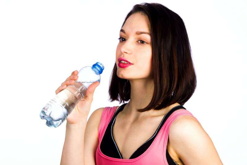young-woman-in-sportswear-with-a-bottle