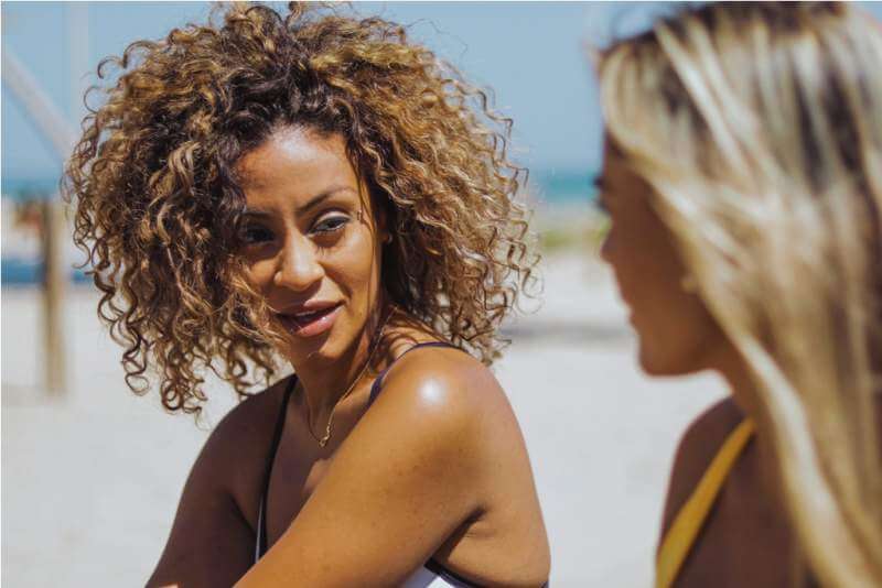 beautiful-women-chatting-on-beach
