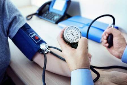 doctor-measuring-blood-pressure-of-patient