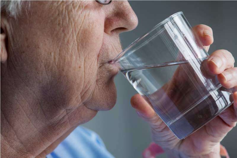 elderly-woman-drinking-water