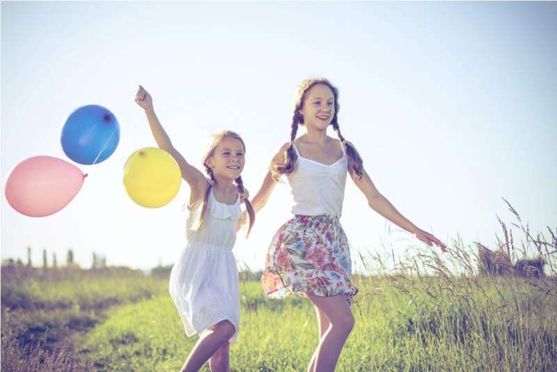 happy-little-children-playing-in-the-field