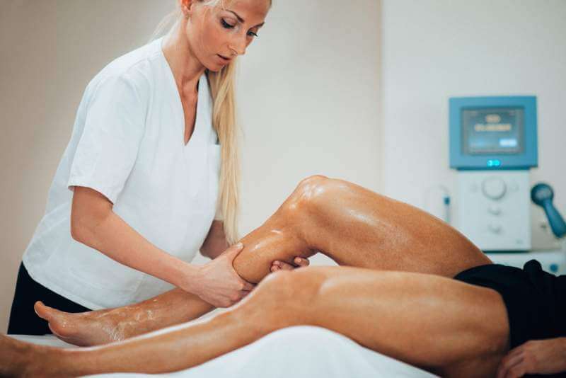 leg-massage-physical-therapyst-massaging-leg