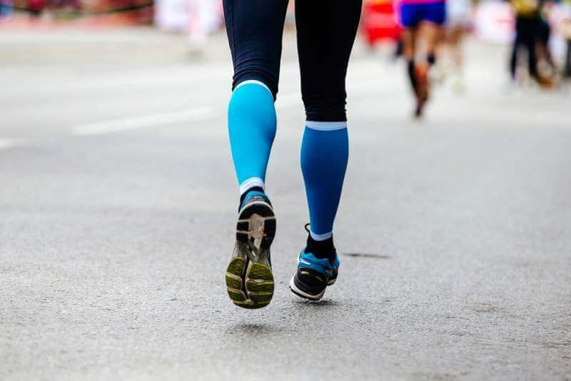back-feet-woman-runner