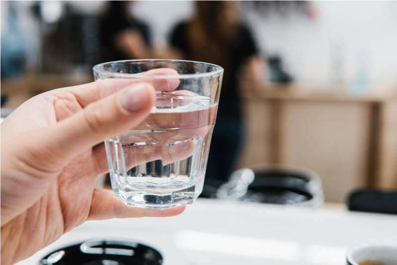 glass-of-water-in-hand