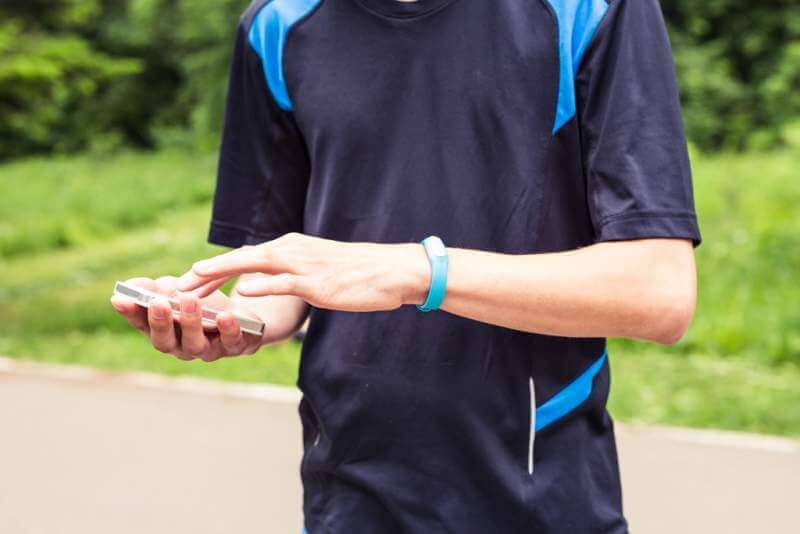 hand-wearing-a-fitness-tracking-armband