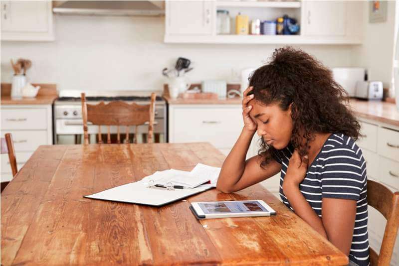 teenage-girl-at-home-using-digital-tablet-being