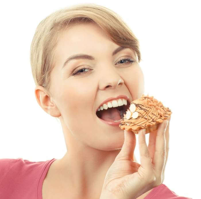 vintage-photo-happy-woman-eating-fresh-cupcake