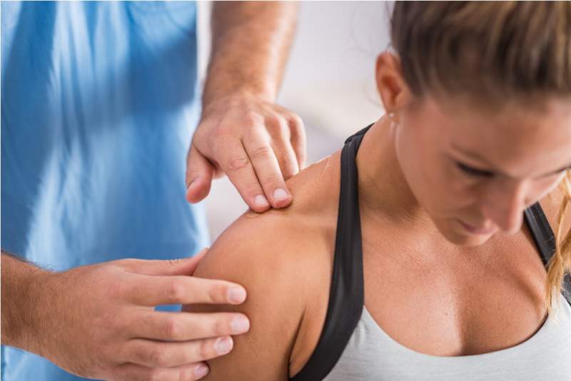 physical-therapy-therapist-addressing-trapezius