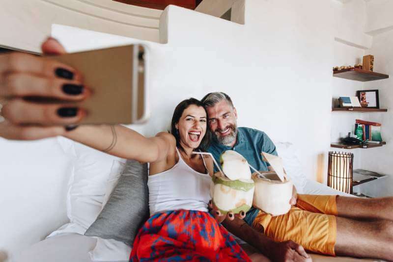 couple-relaxing-on-the-bed