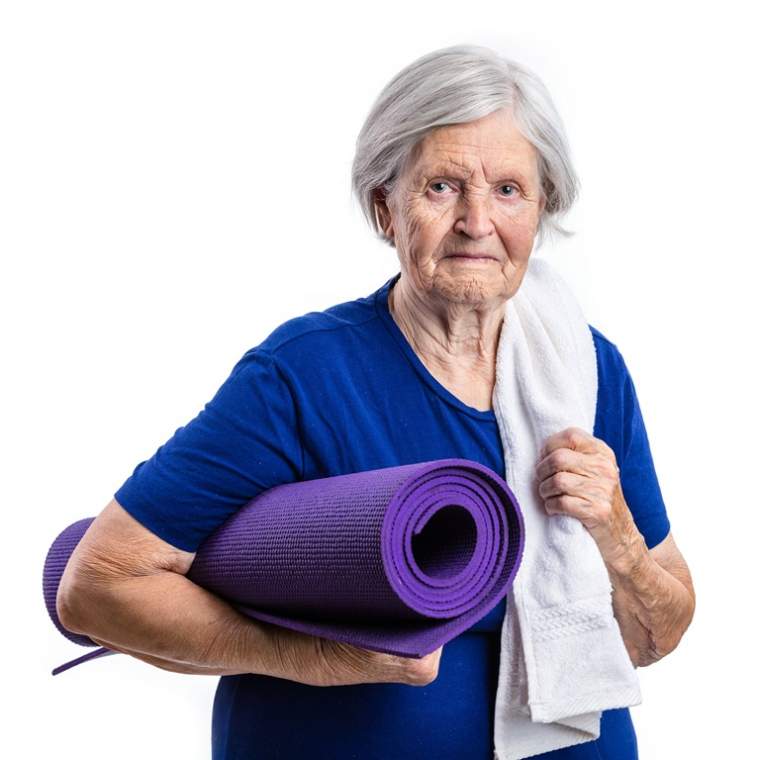 senior-woman-holding-yoga-mat-over-white