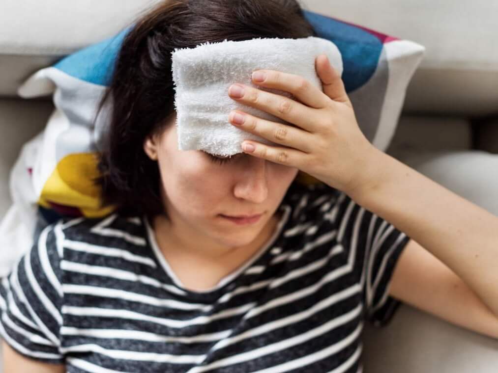 woman-with-a-cold-and-high-fever