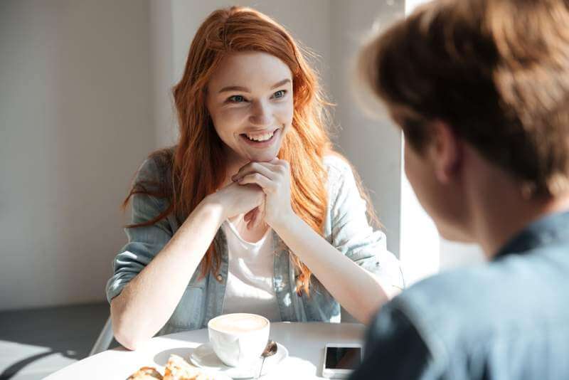 young-student-woman-listening-her-friend