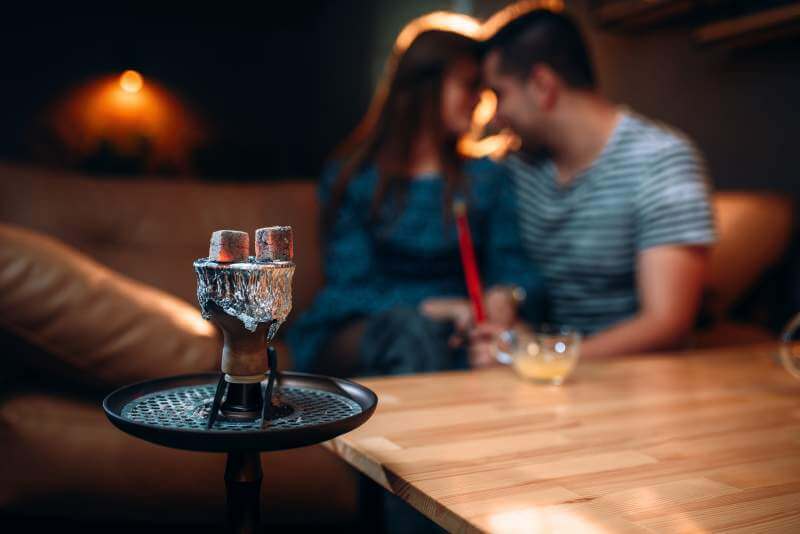 young-couple-relax-and-smoking-hookah