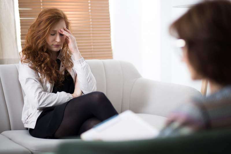 young-depressed-woman-in-psychotherapy