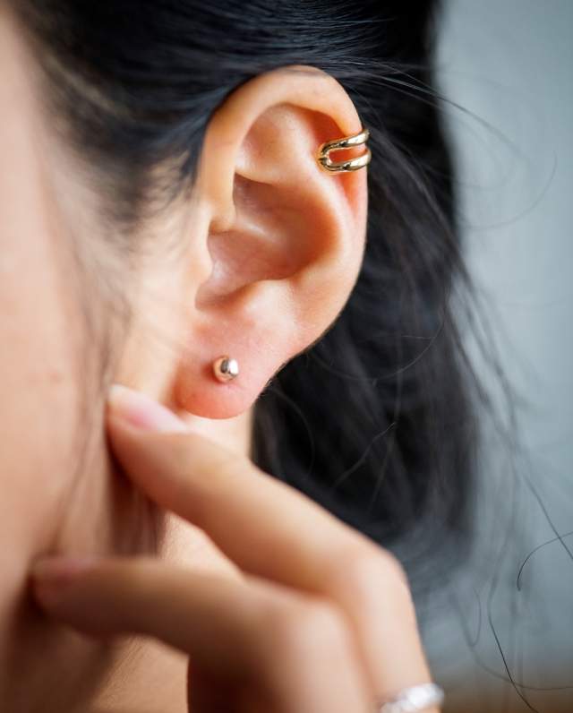 close-up-of-woman-39-s-ear-with-earrings