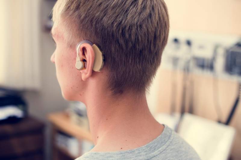 young-man-with-hearing-aid
