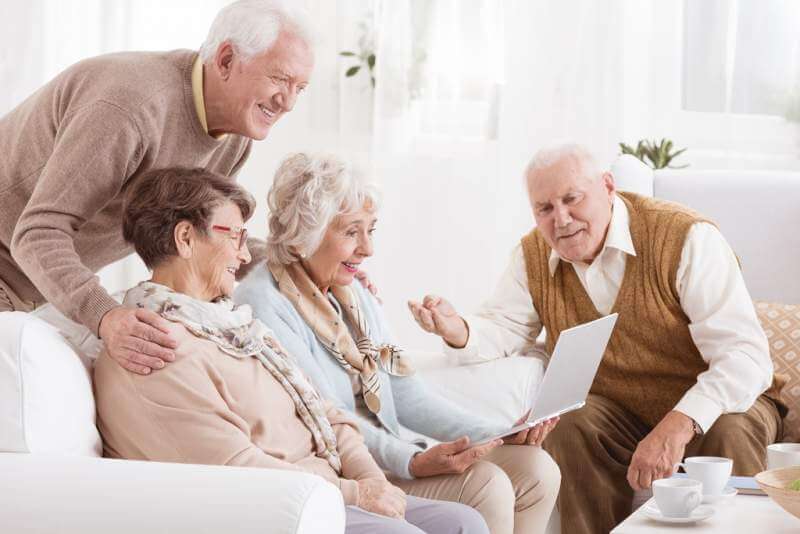 group-of-seniors-with-laptop