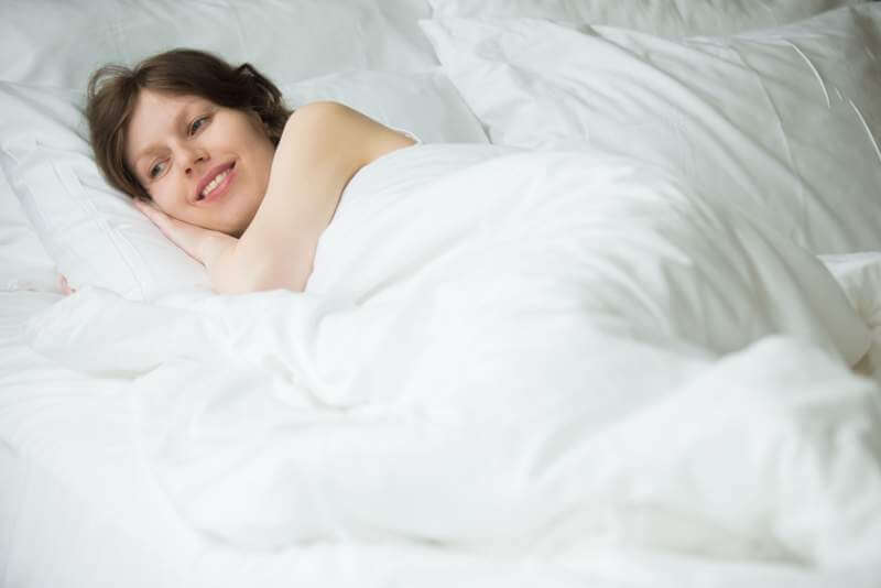 woman-resting-in-bed