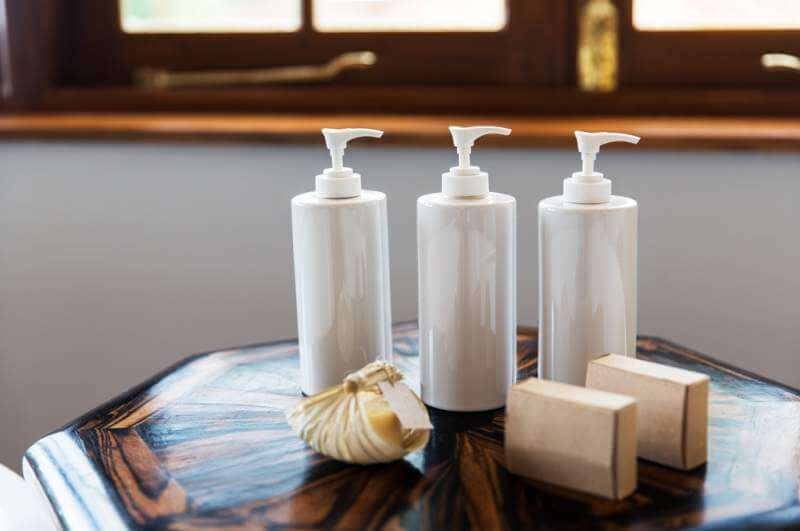 bottles-with-liquid-soap-or-lotion-at-spa