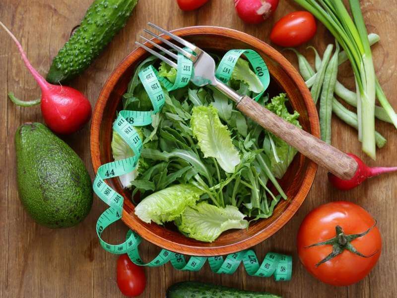 green-salad-with-measuring-tape