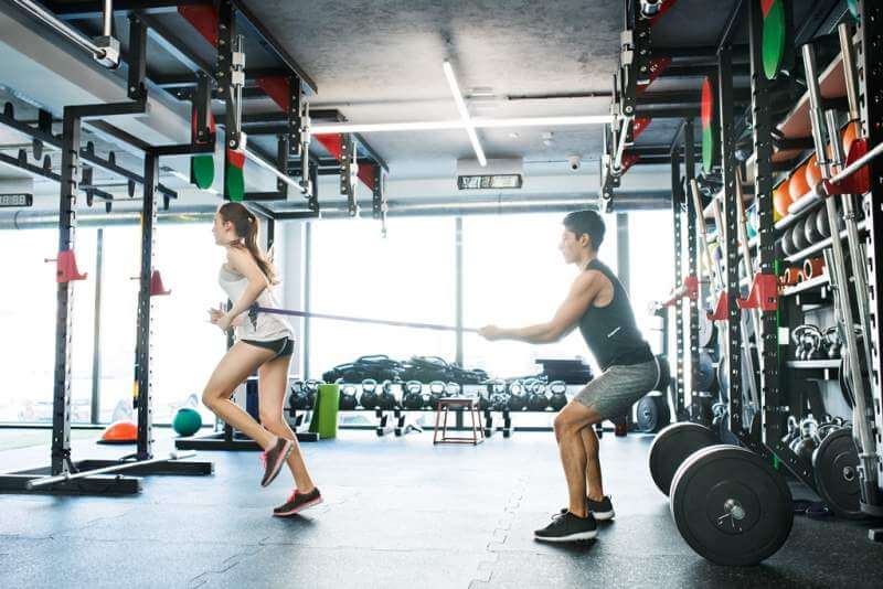 strong-woman-using-a-resistance-band-in-her