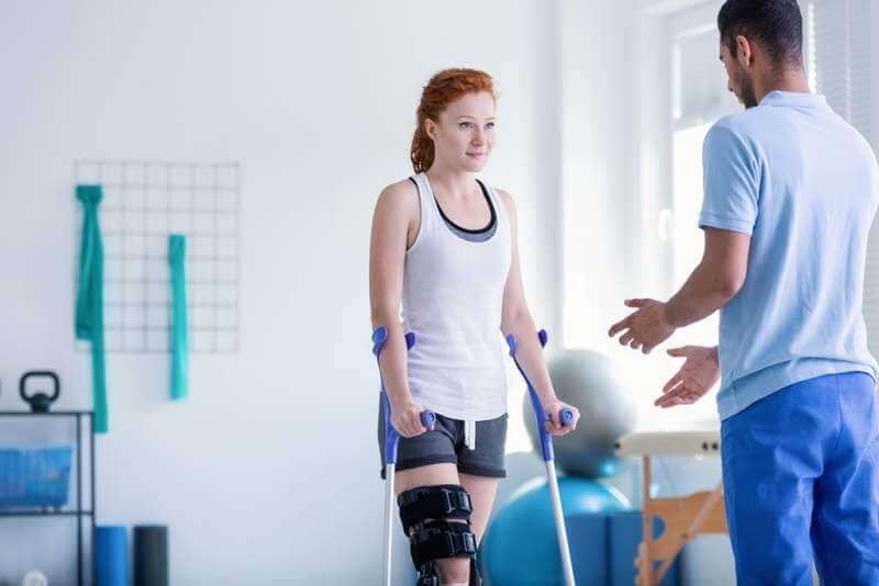 woman-with-crutches-during-rehabilitation