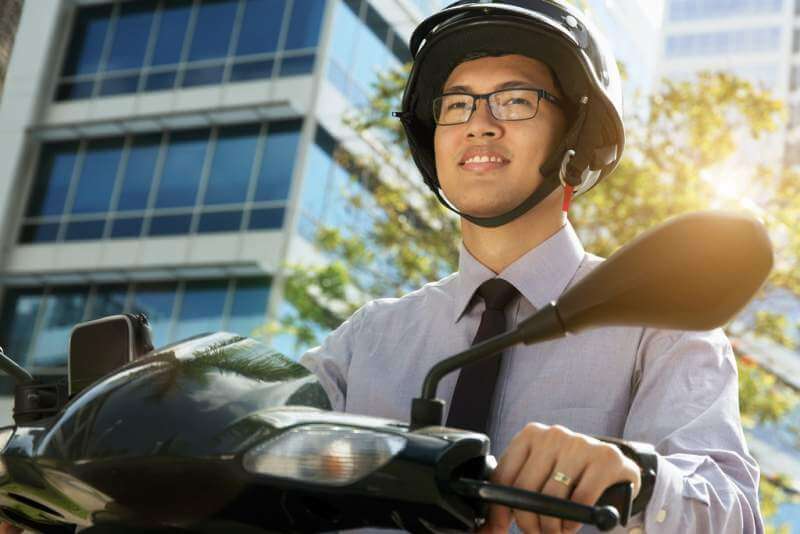 chinese-businessman-commuter-with-scooter