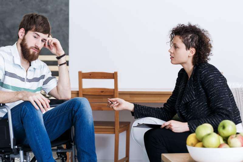 disabled-man-with-young-psychotherapist
