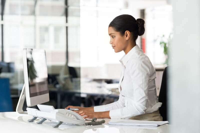 secretary-at-computer-desk