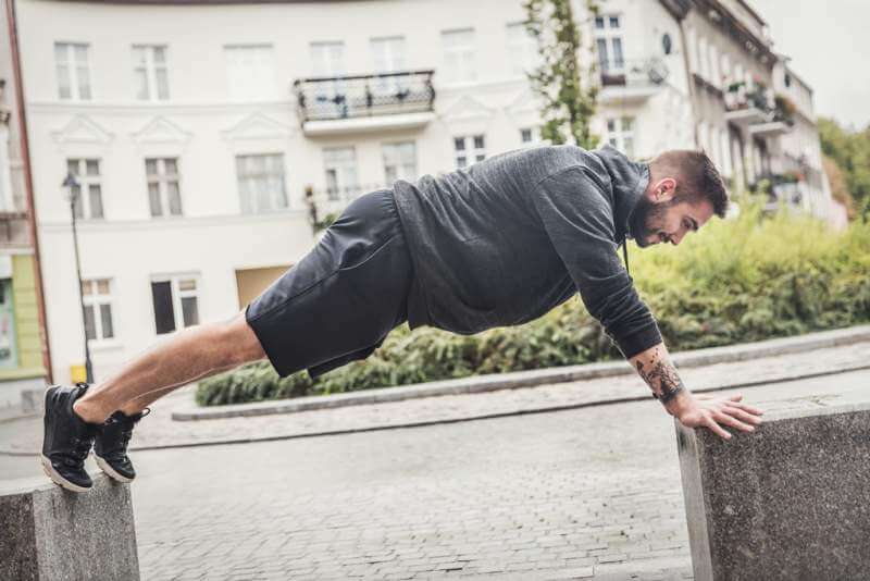 athletic-man-training-on-a-street