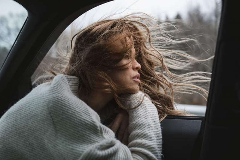 amazing-cute-girl-looking-out-from-car-window