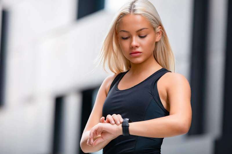 woman-checking-heart-rate-using-smart-watch-after