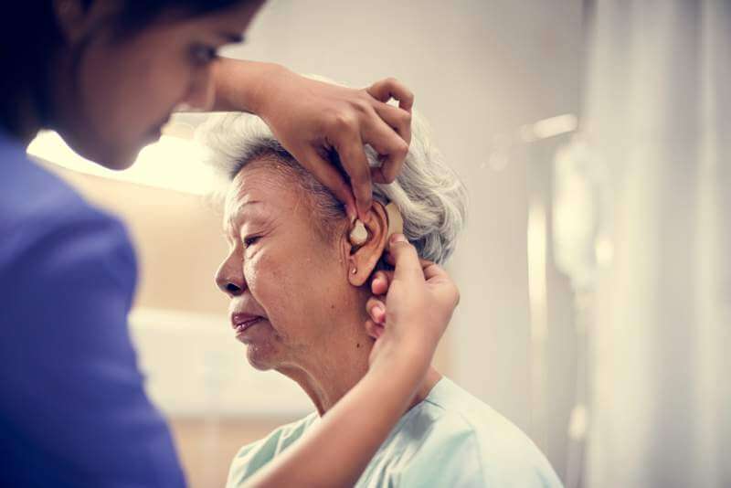 an-elderly-woman-with-hearing-aid