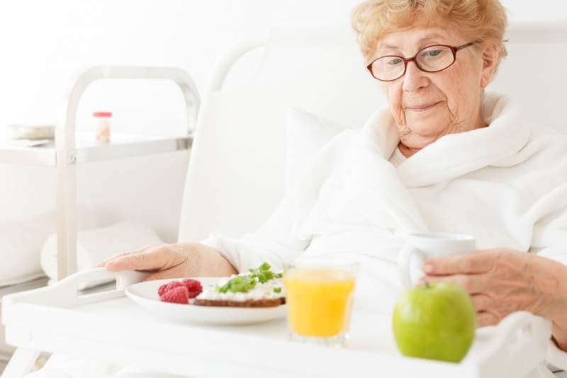 elder-eating-meal-at-hospital