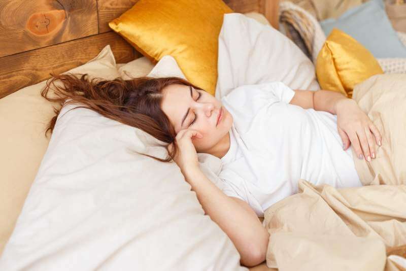 portrait-of-a-young-girl-sleeping-on-a-pillow