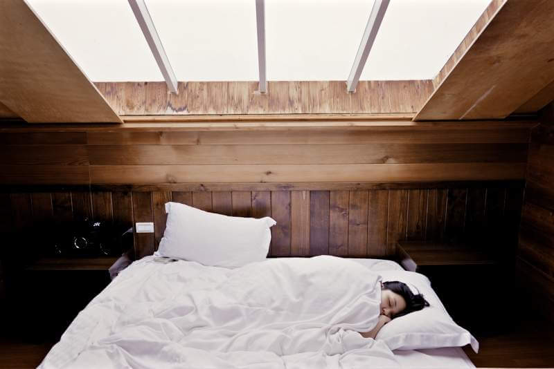 woman-bedroom-sleeping