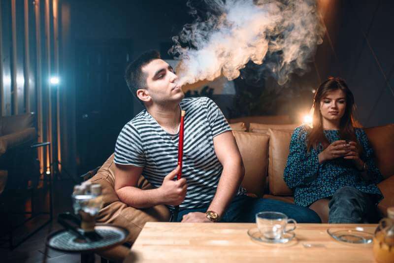 young-couple-relax-and-smoking-hookah