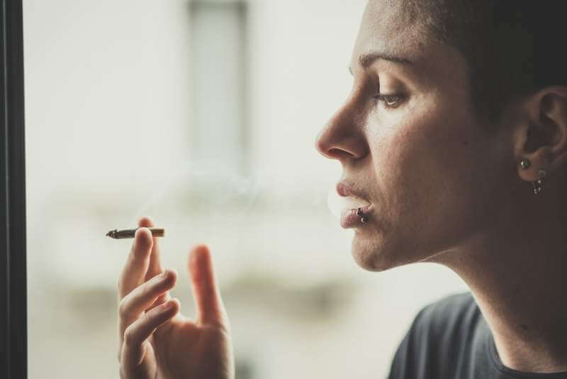 young-lesbian-stylish-hair-style-woman-smoking