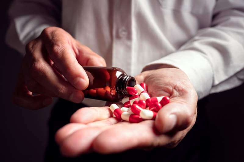 taking-prescription-medicine-pills