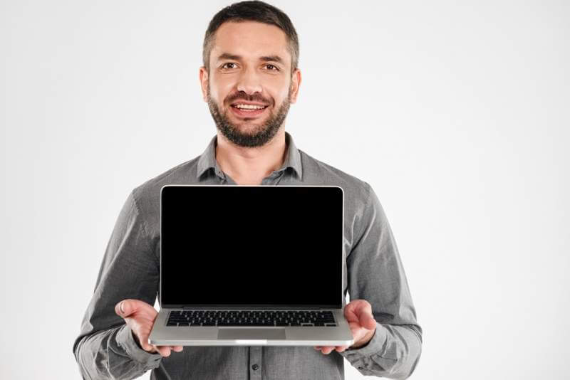 businessman-showing-display-of-laptop-computer